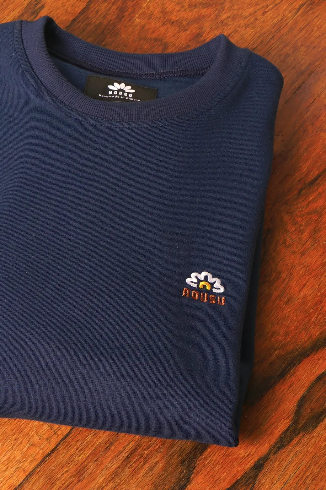 Nousu Valkokultakukka puuvillaneulos